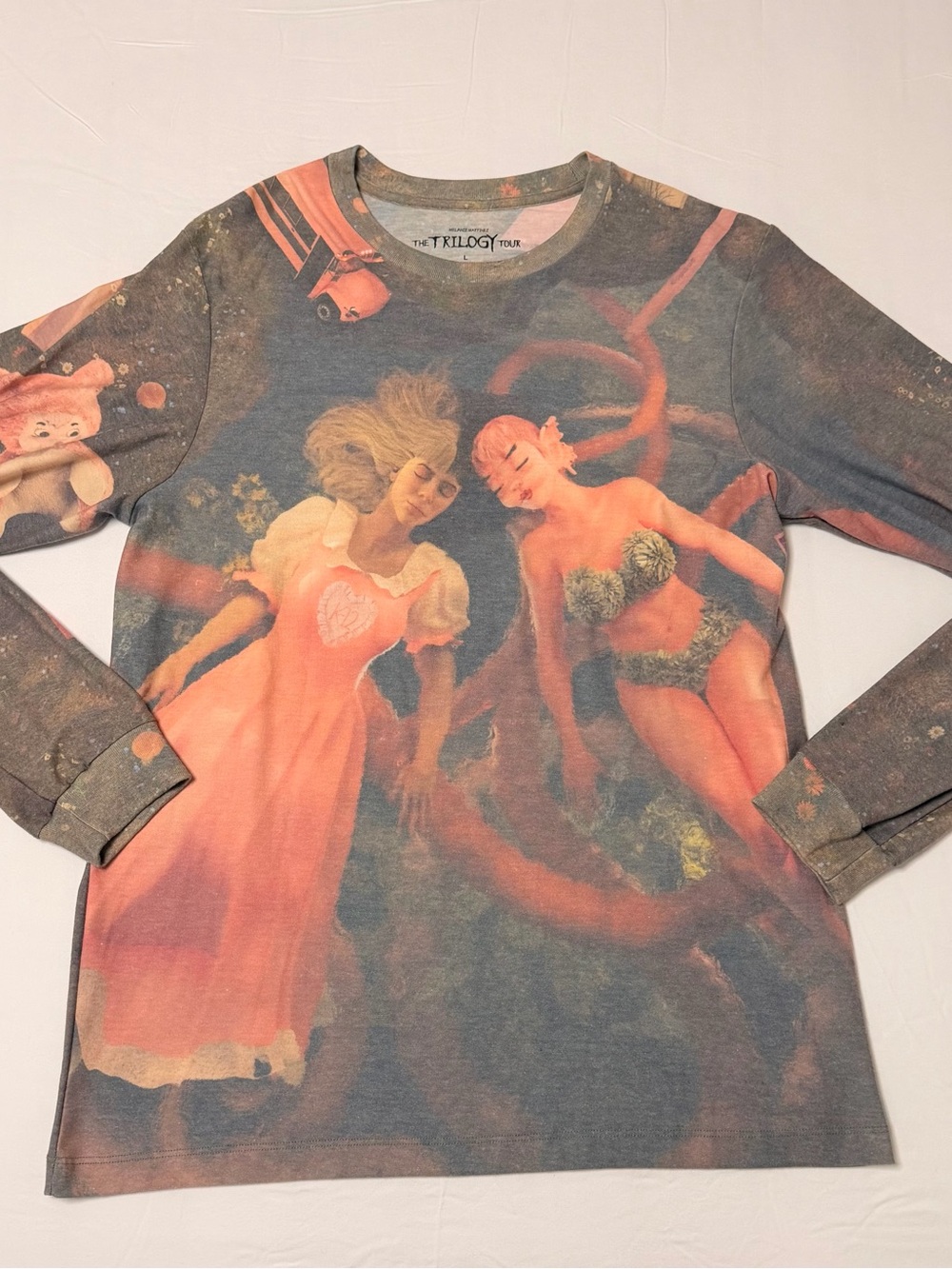 The Trilogy Tour Women's Long Sleeve Graphic Tee in Pink and Gray